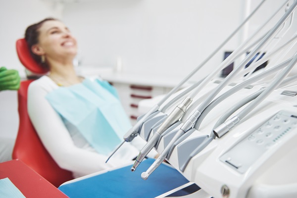 young-female-patient-sitting-on-chair-in-dental-of-2021-04-05-00-44-19-utc.jpg
